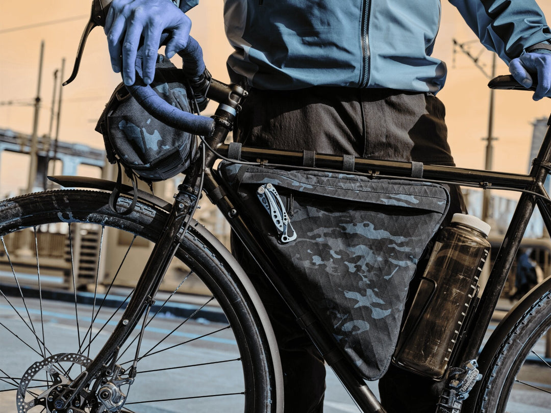 Leatherman multi-tool clipped to a bike frame bag, everyday carry in Singapore