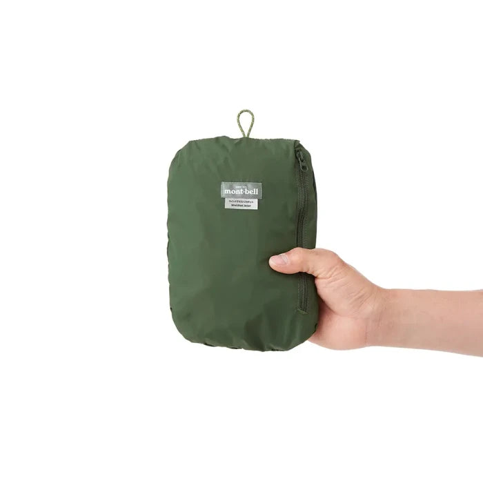 Montbell Wind Blast Jacket Men's in dark green, folded for storage