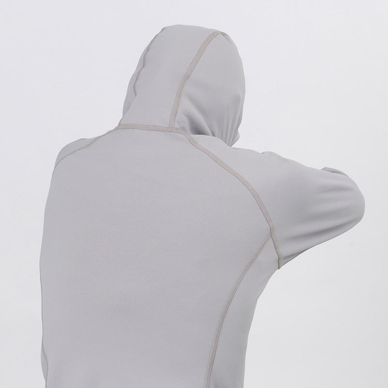 Montbell Women's Trail Action Hooded jacket, four-way stretch fabric demonstration