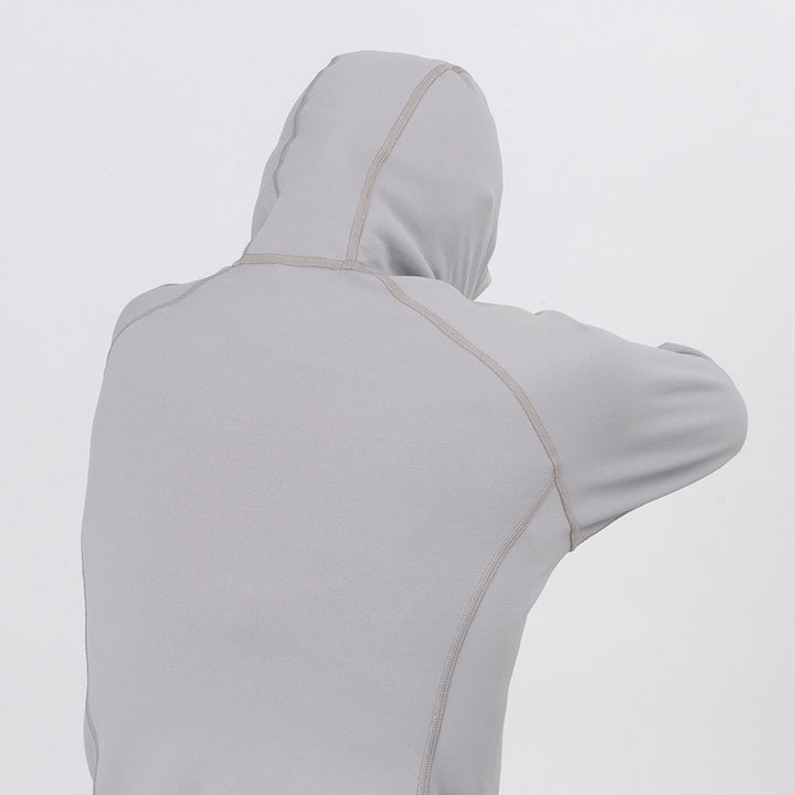 Montbell Women's Trail Action Hooded jacket, four-way stretch fabric demonstration