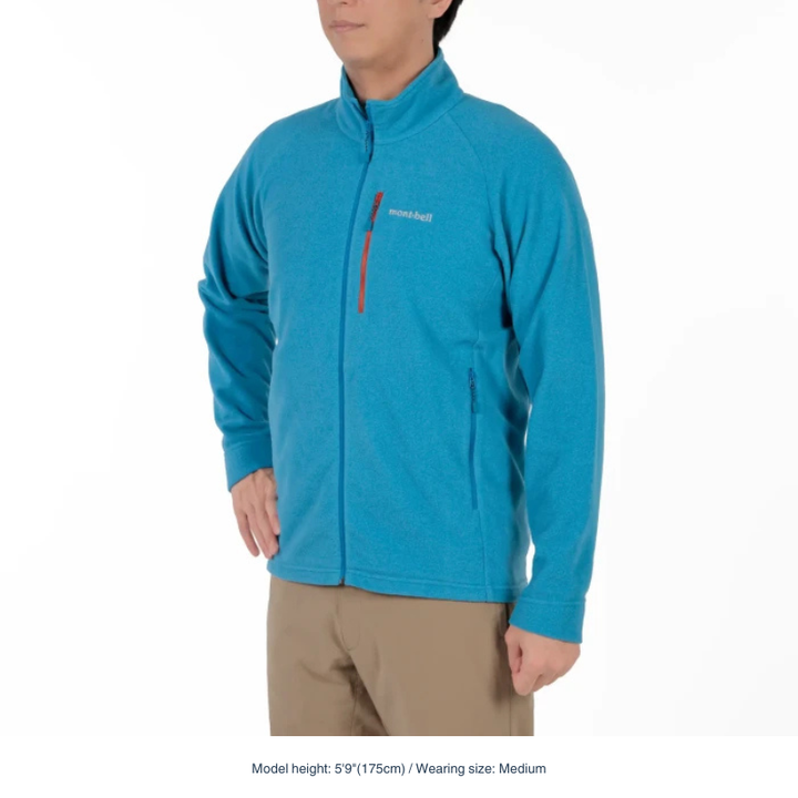 Montbell Men's Fleece Jacket in blue model, showcasing its clean lines and comfortable, easy-wear fit.