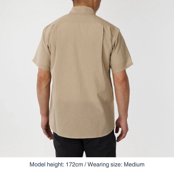 Montbell Men's Wickron Breeze Short Sleeve Shirt in tan, a lightweight and highly breathable outdoor shirt designed for warm-weather trekking.