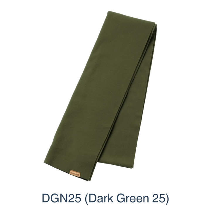 Montbell Fleece Muffler folded neatly to showcase its soft fleece construction and lightweight design.