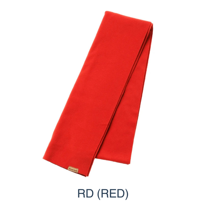 Montbell Fleece Muffler folded neatly to showcase its soft fleece construction and lightweight design.