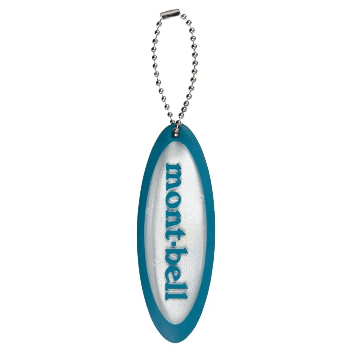 Montbell Safety Reflector Oval Logo in White, featuring a prismatic high-brightness finish and attachment chain.