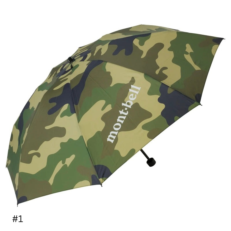A camouflage pattern trekking umbrella with the brand name 'Montbell' printed on it.