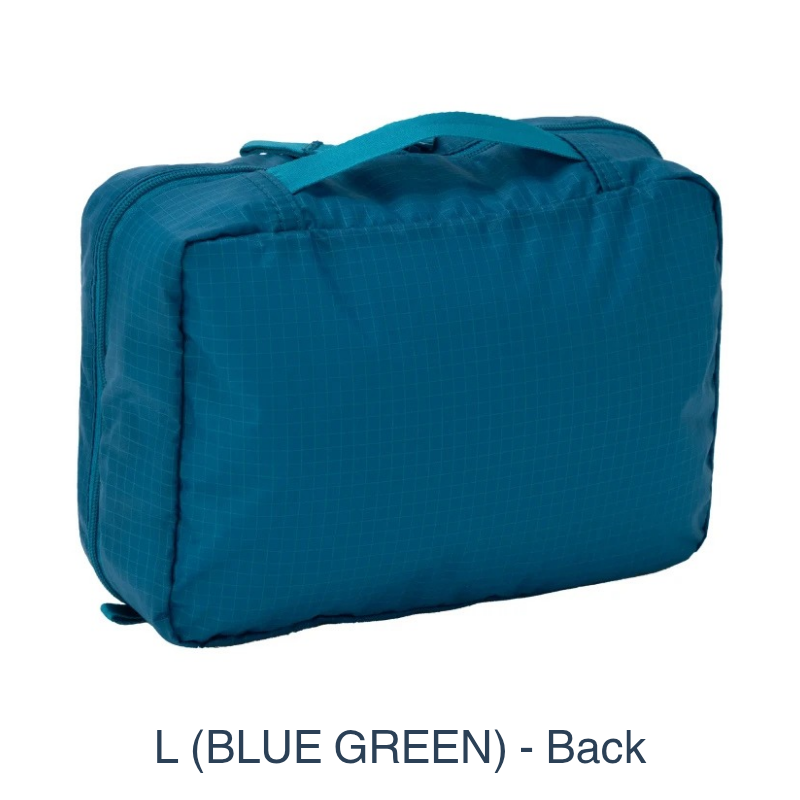 Vertical efficiency for the modern nomad: The Travel Kit Pack (M/L) unfurls to create a tiered workstation, keeping your daily essentials organized and off damp surfaces.