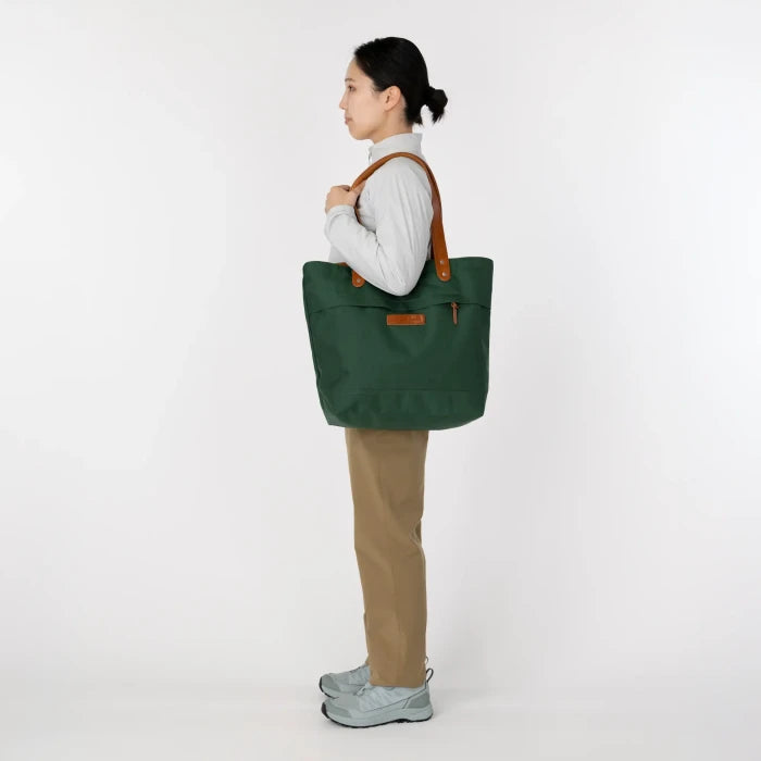 Montbell Rambler Tote carried at the side, alternative view