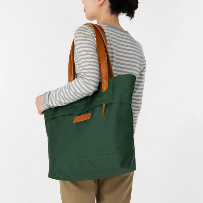 Montbell Rambler Tote carried at the side