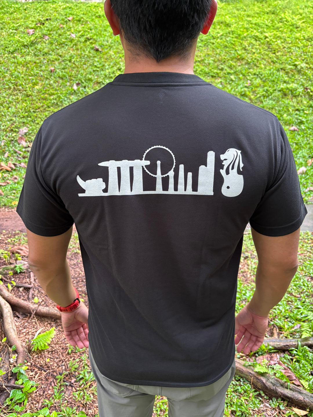 Black Montbell Singapore Icon Wickron T-shirt with white Singapore skyline graphic on the back.