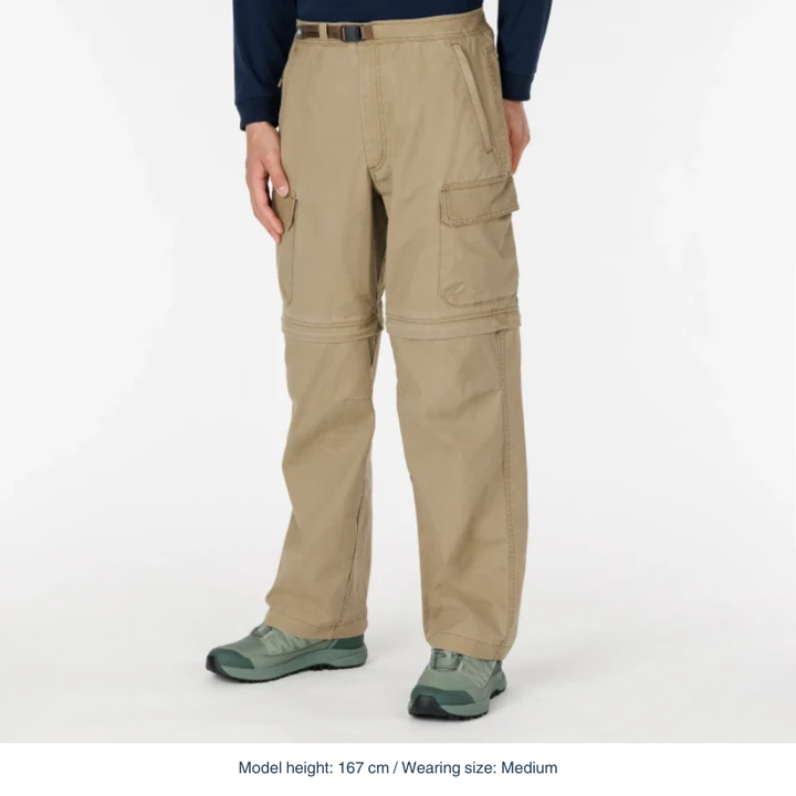 Montbell lightweight performance layer in Tan, a packable and breathable garment designed for outdoor trekking and travel.
