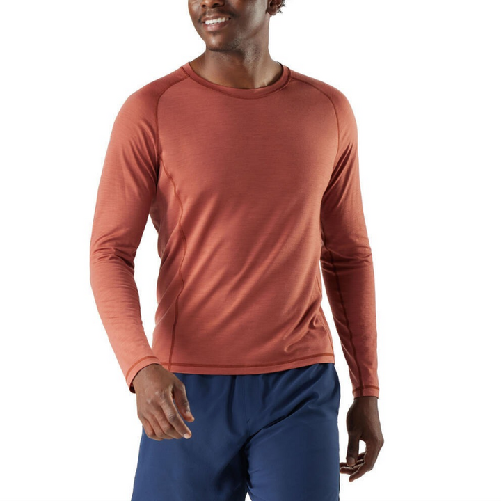 Smartwool Men's Active Ultralite Long Sleeve Tee (SW016546) model in Burnt Sienna. A lightweight, breathable merino wool blend t-shirt designed for active outdoor performance.