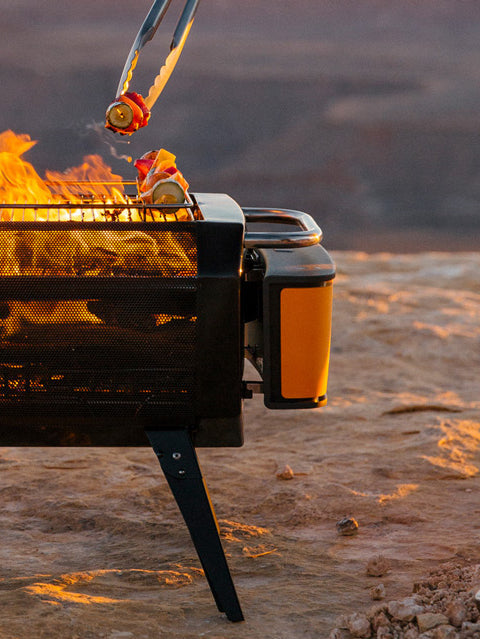 BioLite FirePit+ burning wood outdoors
