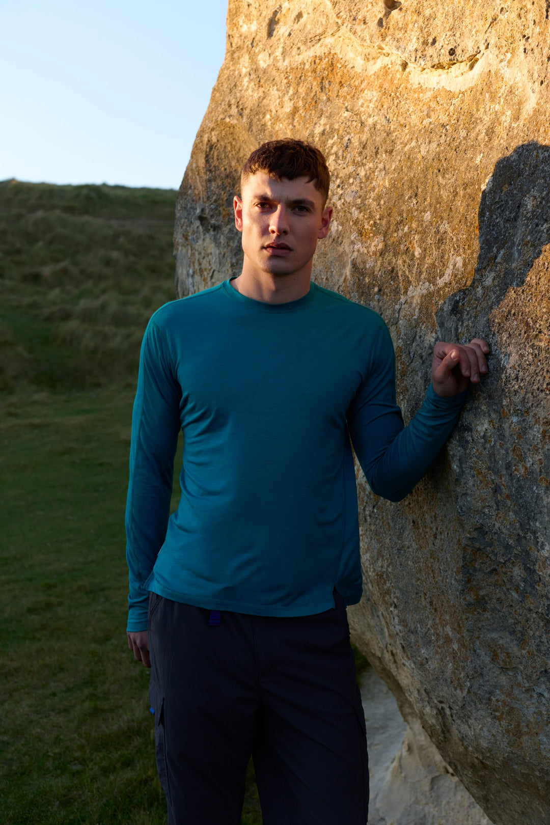 Man wearing the icebreaker 150 MerinoFine Ace long-sleeve tee